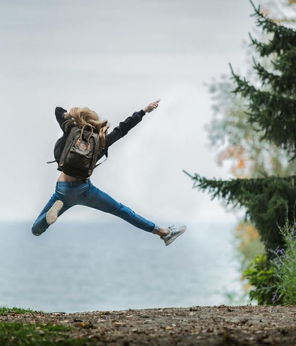 Active woman feeling energetic and happy outdoors.
